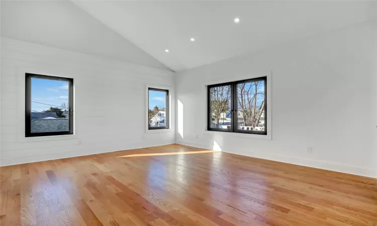 Stairway with hardwood / wood-style flooring