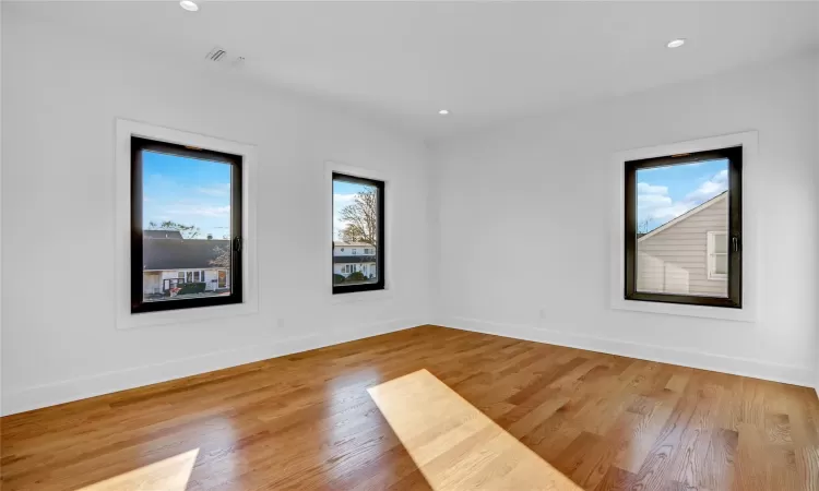 Empty room featuring light wood-type flooring