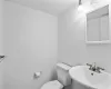 Bathroom with sink and toilet