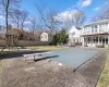 View of pool featuring a diving board, a yard, a playground, and a patio