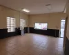 Empty room featuring plenty of natural light and light tile patterned flooring