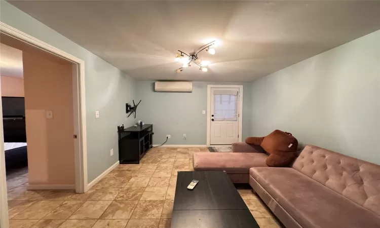 Living room with a wall mounted AC