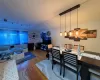 Dining area with hardwood / wood-style floors