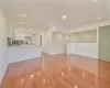 Unfurnished living room with light hardwood / wood-style floors