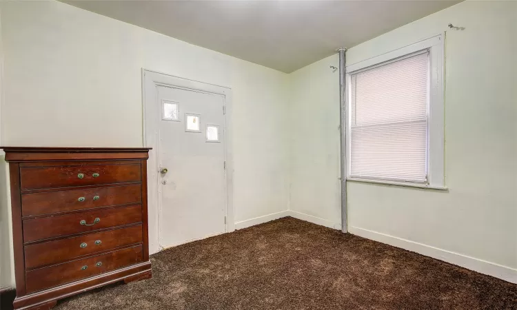 View of carpeted foyer