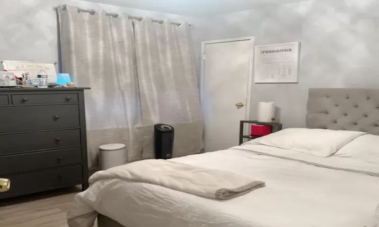 Bedroom featuring light hardwood / wood-style flooring