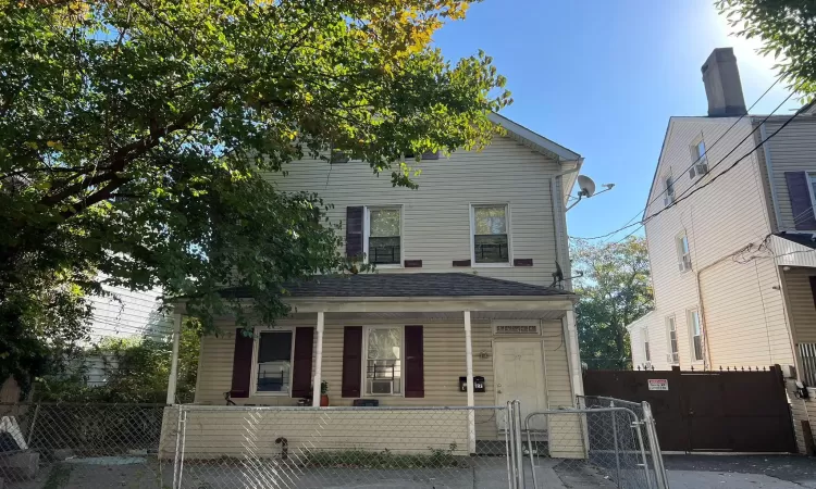 View of front facade featuring a porch