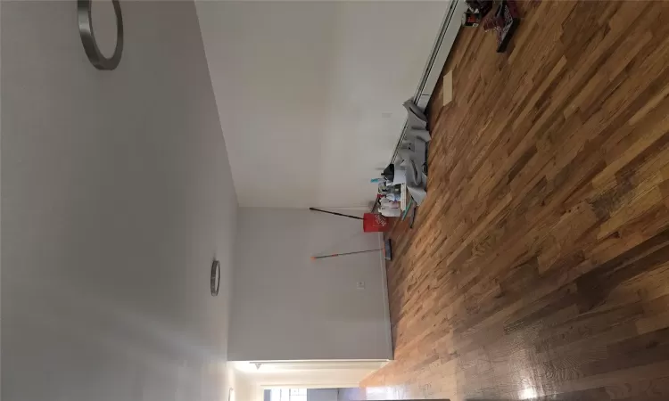 Empty room with wood-type flooring