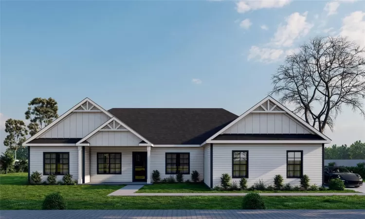 View of front of property featuring a front yard