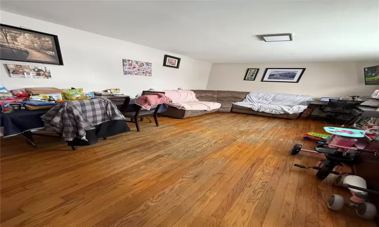 Living room featuring hardwood / wood-style flooring