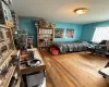 Bedroom featuring wood-type flooring