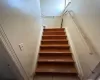 Stairs featuring tile patterned floors