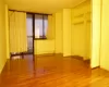 Empty room featuring hardwood / wood-style flooring