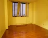 Empty room featuring hardwood / wood-style flooring