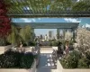 View of patio / terrace featuring a pergola and outdoor lounge area