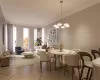 Dining room featuring light parquet flooring, crown molding, and a chandelier