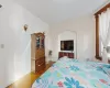 Bedroom featuring hardwood / wood-style flooring