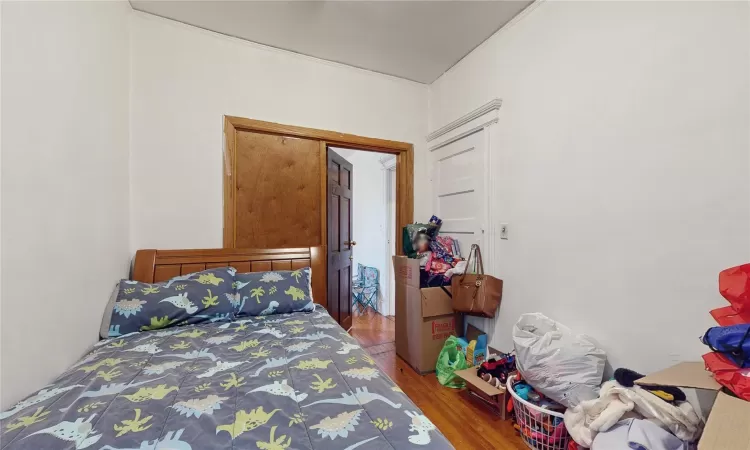 Bedroom featuring hardwood / wood-style floors