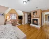 Bedroom with vaulted ceiling, sitting room and gas fireplace