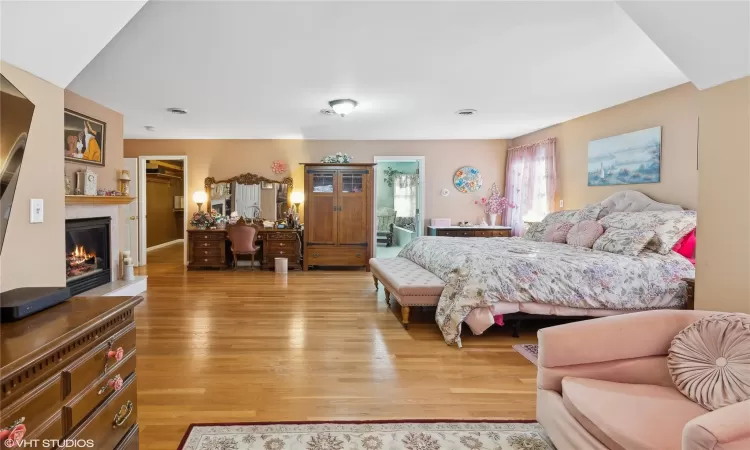 Bedroom featuring wood-type flooring