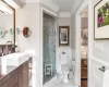 Bathroom with toilet, ornamental molding, walk in shower, and vanity