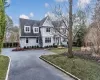 View of front facade featuring a front lawn