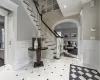 Foyer entrance with ornamental molding and ornate columns