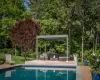 View of pool featuring a patio area, outdoor lounge area, and a yard