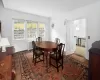 Dining room featuring dark wood-type flooring