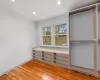 Walk in closet featuring light wood-type flooring