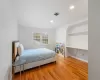 Bedroom featuring hardwood / wood-style flooring