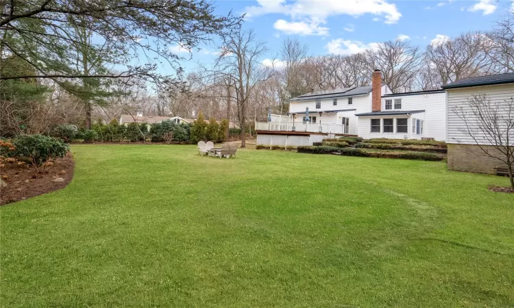 View of yard with a deck