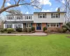 View of front facade with a front yard