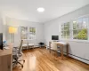 Office area featuring light hardwood / wood-style floors