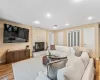 Living room featuring light hardwood / wood-style floors and a fireplace