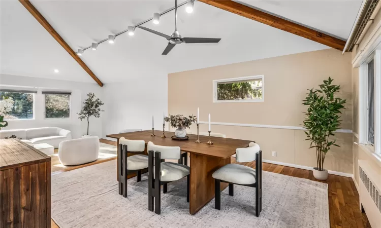 Dining room featuring hardwood flooring and ceiling fan.