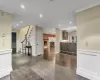 Living room featuring dark tile patterned floors and a fireplace