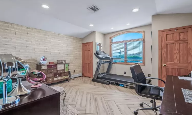 Living room featuring light tile patterned floors and bar area