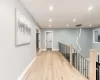 Hall featuring light hardwood / wood-style floors