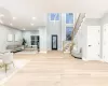 Foyer entrance featuring light hardwood / wood-style floors