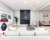 Living room featuring light hardwood / wood-style floors and a fireplace