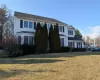 View of front property with a front lawn