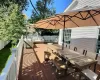 Wooden deck featuring an outdoor hangout area