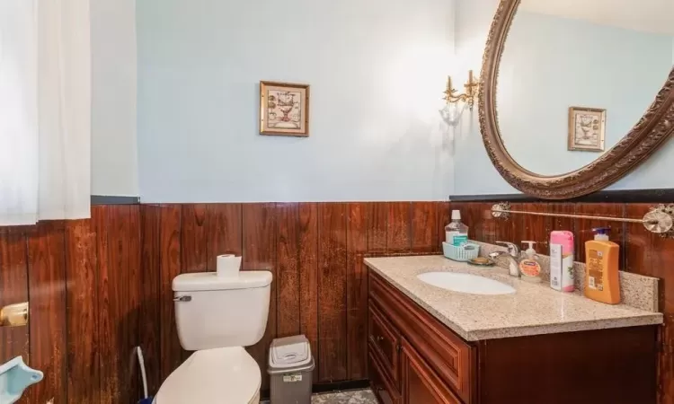 Bathroom with toilet and vanity