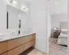 Bathroom with wood-type flooring and vanity