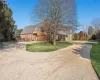 View of front of property featuring a front lawn