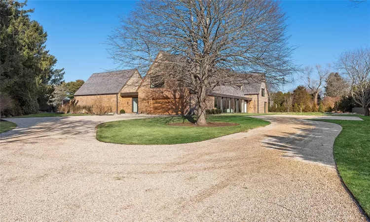 View of front of property featuring a front lawn