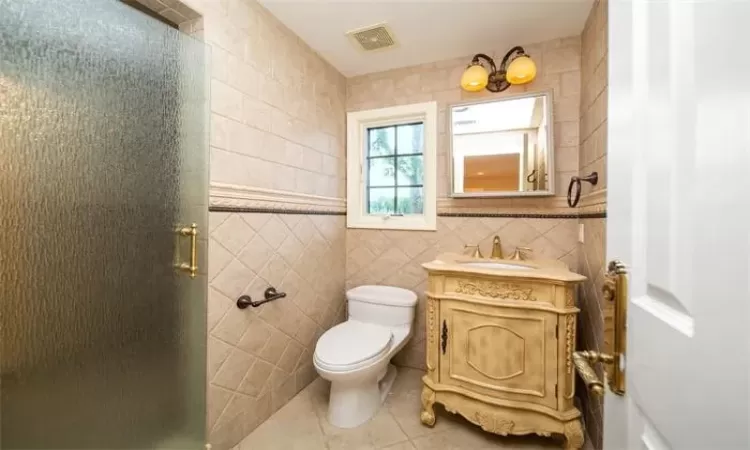 Bathroom with crown molding, sink, tile patterned floors, and shower with separate bathtub