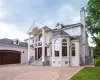 View of front facade featuring a front yard