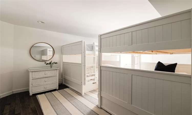 Bedroom featuring dark hardwood / wood-style floors